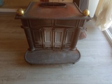 stufa a legna in ghisa usata