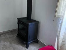 stufa a legna in ghisa usata